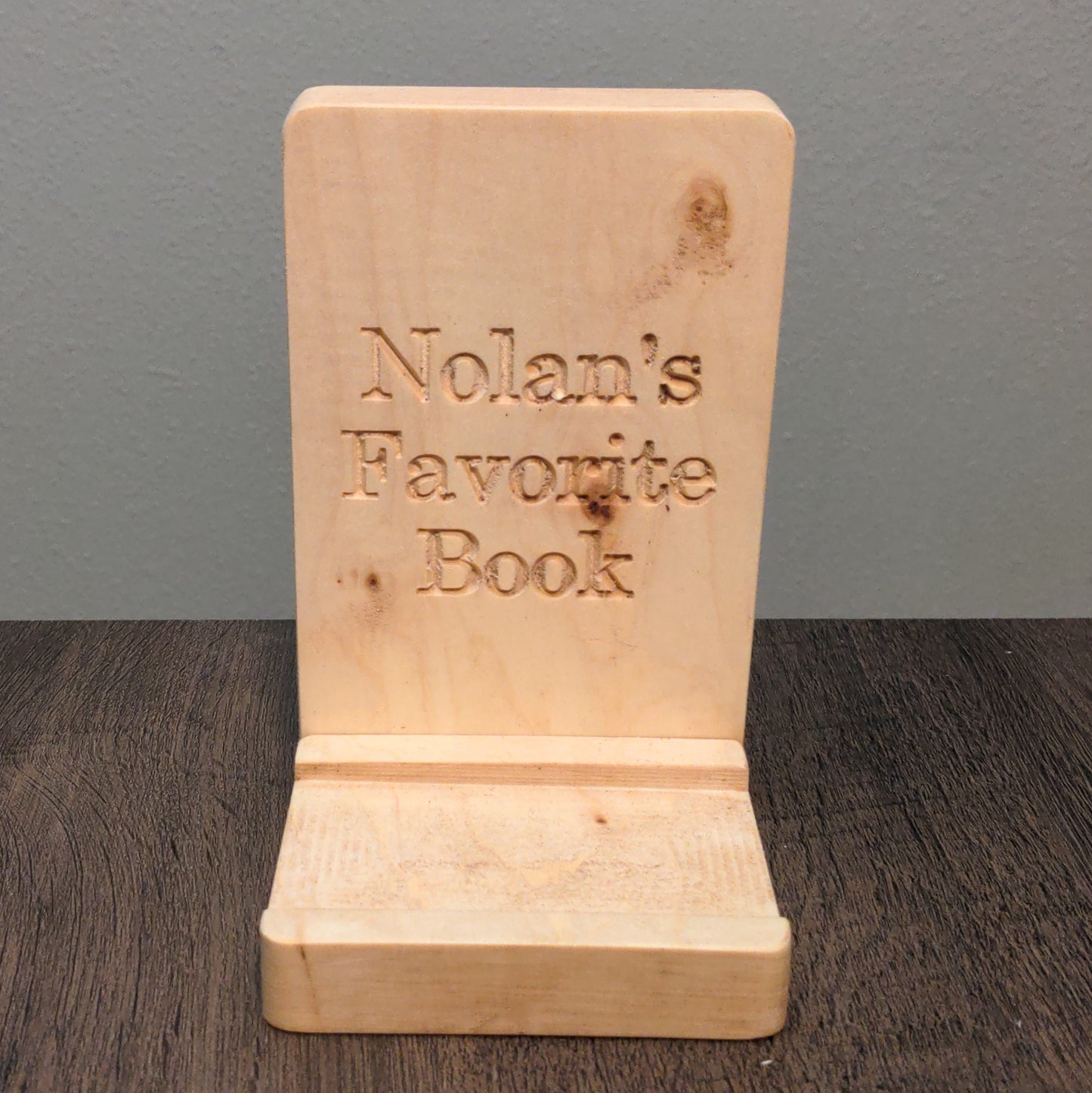 A bedside stand for a favorite book. About the size of a standard bookend