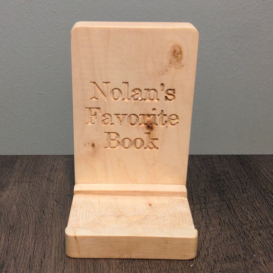 A bedside stand for a favorite book. About the size of a standard bookend